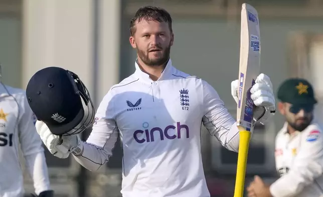 England's Ben Duckett celebrates after scoring century during the second day of the second test cricket match between Pakistan and England, in Multan, Pakistan, Wednesday, Oct. 16, 2024. (AP Photo/K.M. Chaudary)