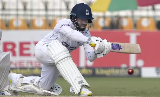 England's Ben Duckett plays a shot during the second day of the second test cricket match between Pakistan and England, in Multan, Pakistan, Wednesday, Oct. 16, 2024. (AP Photo/K.M. Chaudary)