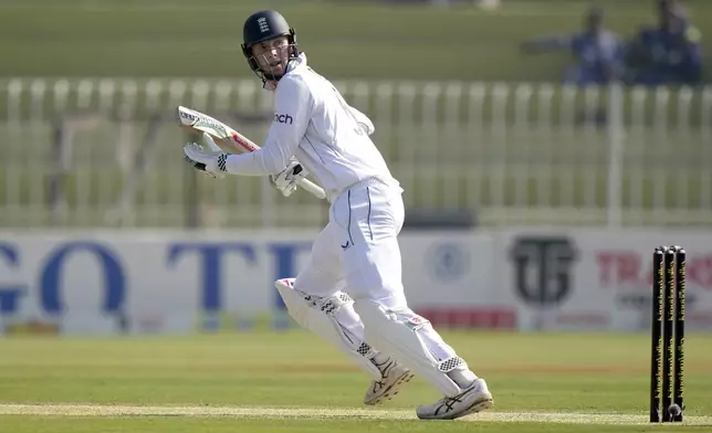 England's Zak Crawley follows the ball after playing a shot during the day one of third test cricket match between Pakistan and England, in Rawalpindi, Pakistan, Thursday, Oct. 24, 2024. (AP Photo/Anjum Naveed)