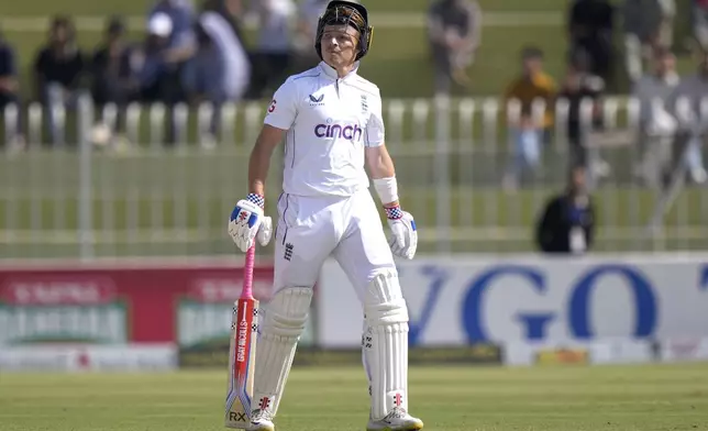 England's Ollie Pope reacts as he walks off the field after his dismissal during the day one of third test cricket match between Pakistan and England, in Rawalpindi, Pakistan, Thursday, Oct. 24, 2024. (AP Photo/Anjum Naveed)