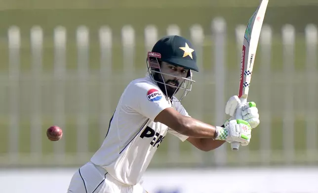 Pakistan's Saud Shakeel plays a shot during the day two of third test cricket match between Pakistan and England, in Rawalpindi, Pakistan, Friday, Oct. 25, 2024. (AP Photo/Anjum Naveed)