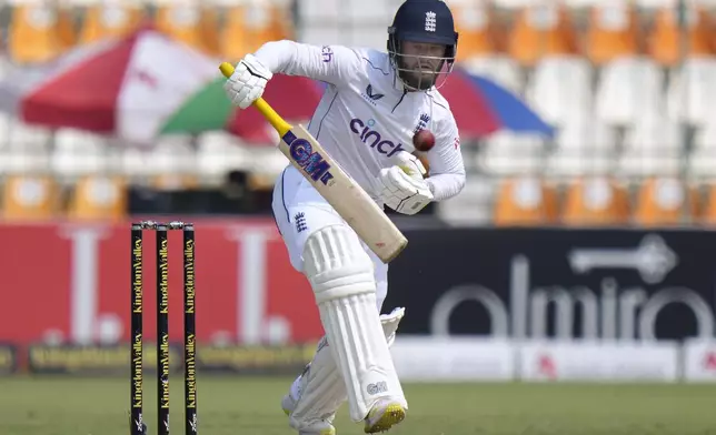 England's Ben Duckett plays a shot during the third day of the first test cricket match between Pakistan and England, in Multan, Pakistan, Wednesday, Oct. 9, 2024. (AP Photo/Anjum Naveed)