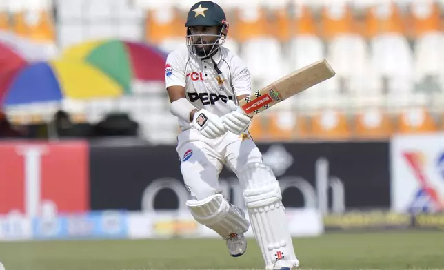 Pakistan's Saud Shakeel bats during the second day of the first test cricket match between Pakistan and England, in Multan, Pakistan, Tuesday, Oct. 8, 2024. (AP Photo/Anjum Naveed)