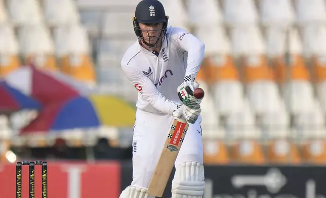 England's Zak Crawley plays a shot during the second day of the first test cricket match between Pakistan and England, in Multan, Pakistan, Tuesday, Oct. 8, 2024. (AP Photo/Anjum Naveed)