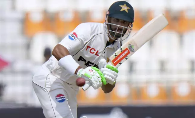 Pakistan's Shan Masood plays a shot during the first day of the first test cricket match between Pakistan and England, in Multan, Pakistan, Monday, Oct. 7, 2024. (AP Photo/Anjum Naveed)