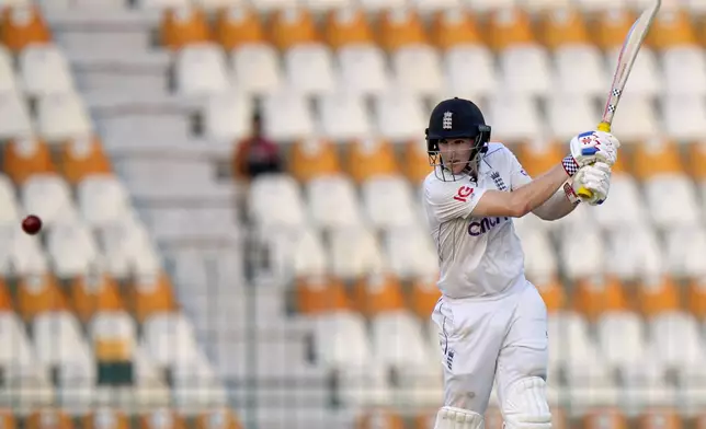 England's Harry Brook plays a shot during the third day of the first test cricket match between Pakistan and England, in Multan, Pakistan, Wednesday, Oct. 9, 2024. (AP Photo/Anjum Naveed)