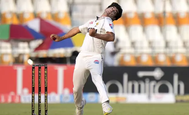 Pakistan's Naseem Shah bowls during the second day of the first test cricket match between Pakistan and England, in Multan, Pakistan, Tuesday, Oct. 8, 2024. (AP Photo/Anjum Naveed)