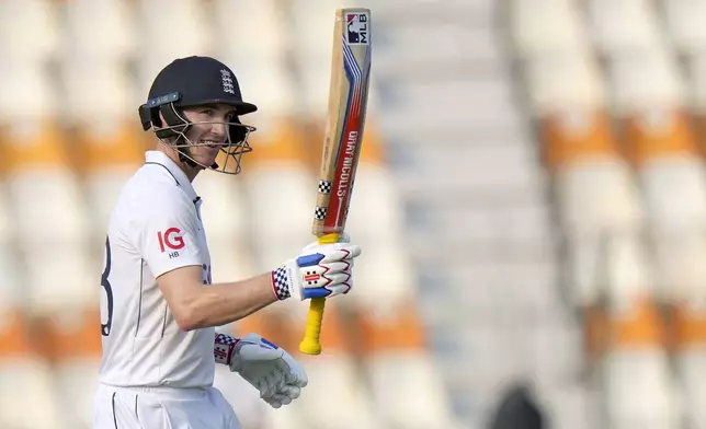 England's Harry Brook celebrates after scoring century during the third day of the first test cricket match between Pakistan and England, in Multan, Pakistan, Wednesday, Oct. 9, 2024. (AP Photo/Anjum Naveed)