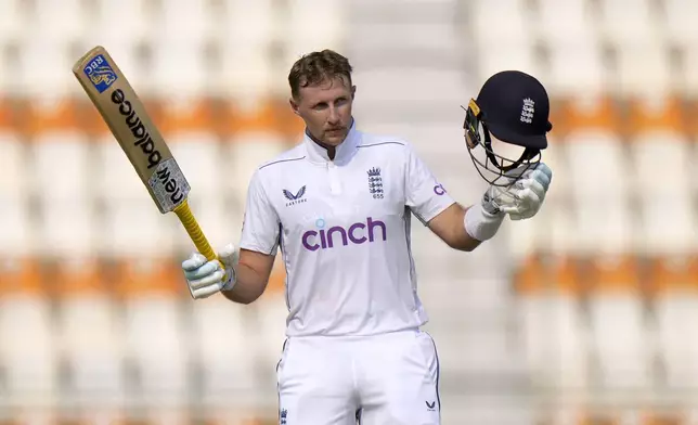 England's Joe Root celebrates after scoring century during the third day of the first test cricket match between Pakistan and England, in Multan, Pakistan, Wednesday, Oct. 9, 2024. (AP Photo/Anjum Naveed)