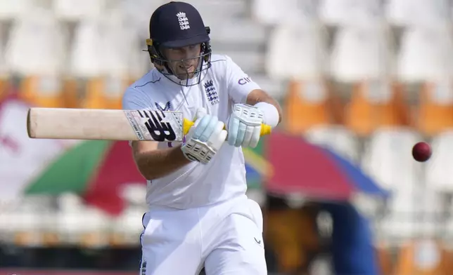 England's Joe Root plays a shot during the third day of the first test cricket match between Pakistan and England, in Multan, Pakistan, Wednesday, Oct. 9, 2024. (AP Photo/Anjum Naveed)