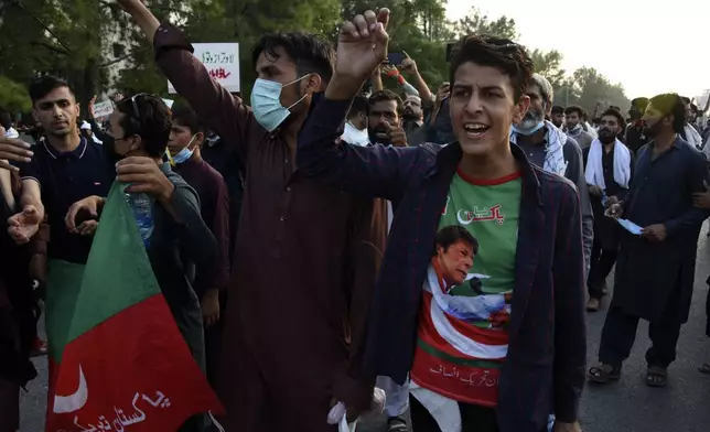 Supporters of imprisoned former Prime Minister Imran Khan's party Pakistan Tehreek-e-Insaf chant slogans asking for the release of Imran Khan during a protest in Islamabad, Pakistan, Friday, Oct. 4, 2024.(AP Photo/W.K. Yousafzai)