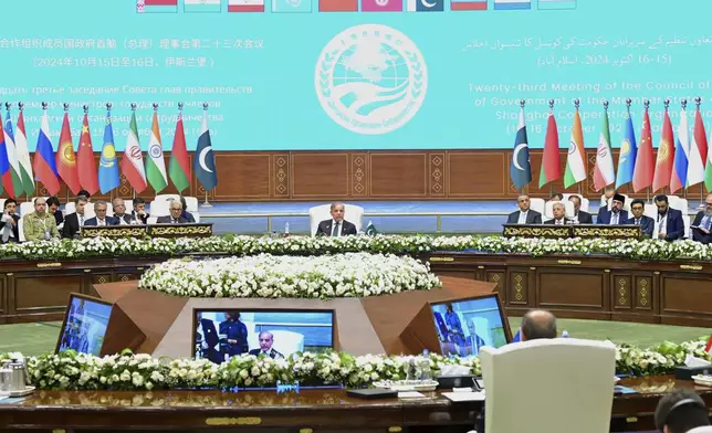 In this photo released by the Press Information Department, Pakistan's Prime Minister Shehbaz Sharif, center, delivers his speech at the opening session of Shanghai Cooperation Organization (SCO) meeting, in Islamabad, Pakistan, Wednesday, Oct. 16, 2024. (Press Information Department via AP)