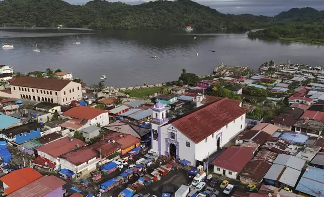 The San Felipe Church, which houses the Black Christ, stands in Portobelo, Panama, early Monday, Oct. 21, 2024, during a festival celebrating the iconic statue that was found on the shore in 1658. (AP Photo/Matias Delacroix)