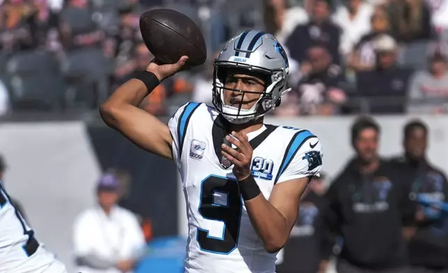 Carolina Panthers quarterback Bryce Young (9) throws against the Chicago Bears during the second half of an NFL football game Sunday, Oct. 6, 2024, in Chicago. (AP Photo/Charles Rex Arbogast)