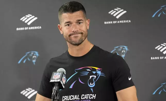 Carolina Panthers head coach Dave Canales talks with reporters after his team's 36-10 loss to the Chicago Bears in an NFL football game Sunday, Oct. 6, 2024, in Chicago. (AP Photo/Charles Rex Arbogast)