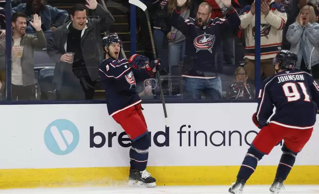 Columbus Blue Jackets' Cole Sillinger celebrates his goal against the Florida Panthers during the second period of an NHL hockey game Tuesday, Oct. 15, 2024, in Columbus, Ohio. (AP Photo/Jay LaPrete)