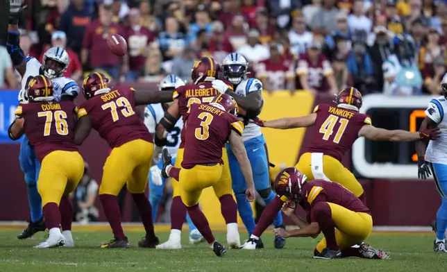 Washington Commanders place kicker Austin Seibert (3) kicks a field goal during the first half of an NFL football game against the Carolina Panthers, Sunday, Oct. 20, 2024, in Landover, Md. (AP Photo/Stephanie Scarbrough)