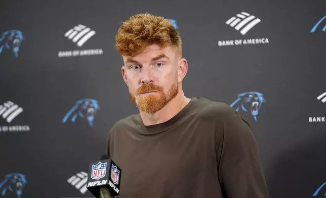 Carolina Panthers quarterback Andy Dalton speaks during a news conference after an NFL football game against the Washington Commanders, Sunday, Oct. 20, 2024, in Landover, Md. The Commanders 40-7. (AP Photo/Stephanie Scarbrough)