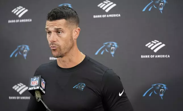 Carolina Panthers head coach Dave Canales speaks during a news conference after an NFL football game against the Washington Commanders, Sunday, Oct. 20, 2024, in Landover, Md. The Commanders 40-7. (AP Photo/Stephanie Scarbrough)