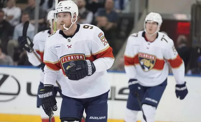 Florida Panthers' Sam Bennett (9) skates toward his bench after scoring during the second period of an NHL hockey game against the New York Rangers, Thursday, Oct. 24, 2024, in New York. (AP Photo/Frank Franklin II)