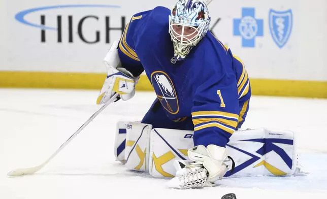 Buffalo Sabres goaltender Ukko-Pekka Luukkonen (1) makes a save during the second period of an NHL hockey game against the Florida Panthers, Monday, Oct. 28, 2024, in Buffalo, N.Y. (AP Photo/Jeffrey T. Barnes)