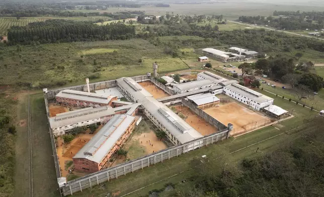 The Regional Penitentiary is surrounded by fields in Coronel Oviedo, Paraguay, Friday, Aug. 30, 2024. (AP Photo/Rodrigo Abd)