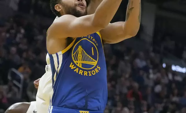 Golden State Warriors forward Kyle Anderson (1) shoots against New Orleans Pelicans forward Jamal Cain during the first half of an NBA basketball game in San Francisco, Wednesday, Oct. 30, 2024. (AP Photo/Jeff Chiu)