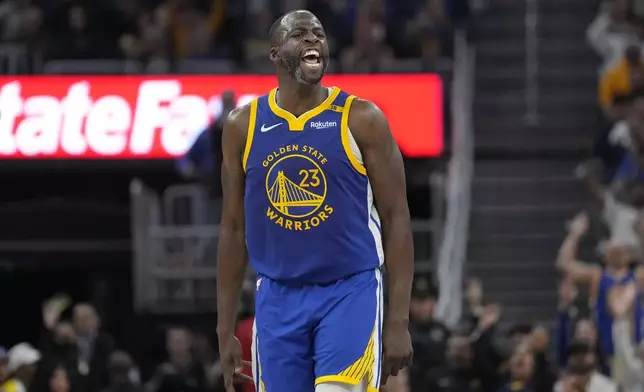 Golden State Warriors forward Draymond Green reacts after making a three-point basket against the New Orleans Pelicans during the first half of an NBA basketball game in San Francisco, Wednesday, Oct. 30, 2024. (AP Photo/Jeff Chiu)