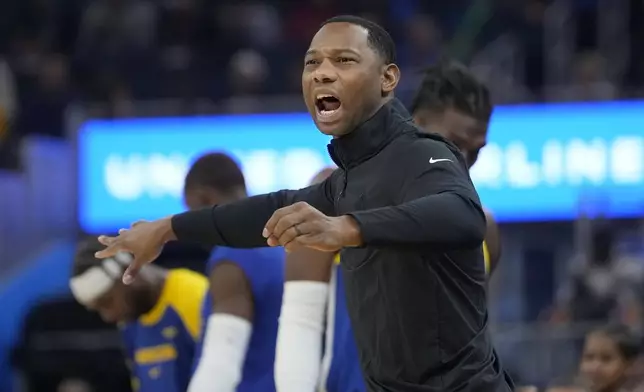 New Orleans Pelicans head coach Willie Green gestures toward players during the first half of an NBA basketball game against the Golden State Warriors in San Francisco, Wednesday, Oct. 30, 2024. (AP Photo/Jeff Chiu)