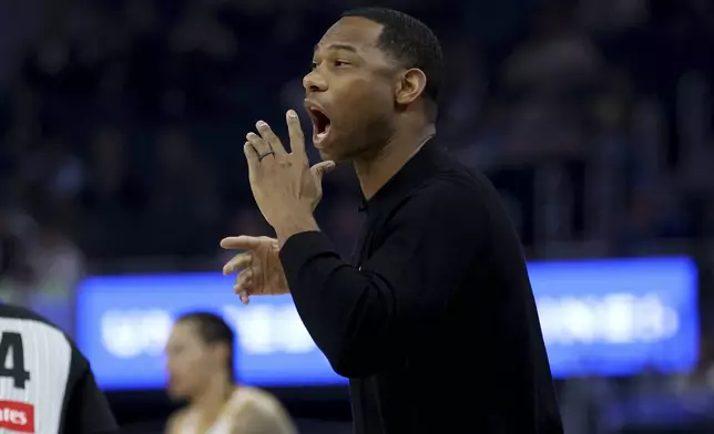 New Orleans Pelicans head coach Willie Green yells to his team against the Golden State Warriors during the first half of an NBA basketball game in San Francisco, Tuesday, Oct. 29, 2024. (AP Photo/Jed Jacobsohn)