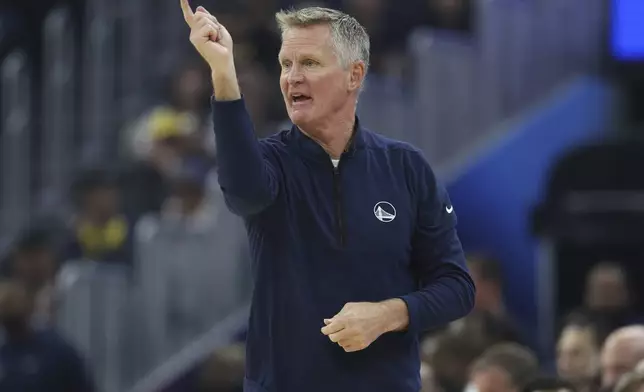 Golden State Warriors head coach Steve Kerr gestures to his team during the first half of an NBA basketball game against the New Orleans Pelicans in San Francisco, Tuesday, Oct. 29, 2024. (AP Photo/Jed Jacobsohn)