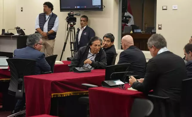 Peruvian former President Alejandro Toledo attends a court session where the judge will rule in his corruption case in Lima, Peru, Monday, Oct. 21, 2024. (AP Photo/Guadalupe Pardo)