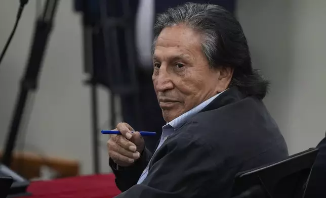 Former Peruvian President Alejandro Toledo attends a court session where the judge will rule in his corruption case in Lima, Peru, Monday, Oct. 21, 2024. (AP Photo/Guadalupe Pardo)