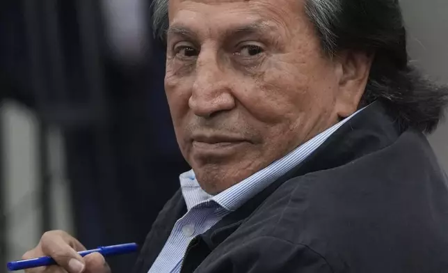 Former Peruvian President Alejandro Toledo attends a court session where the judge will rule in his corruption case in Lima, Peru, Monday, Oct. 21, 2024. (AP Photo/Guadalupe Pardo)