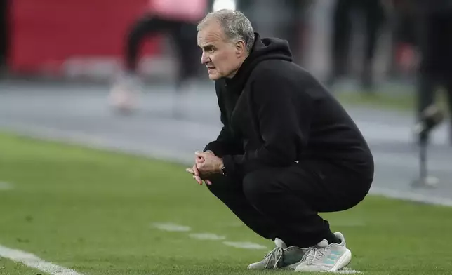 Uruguay's coach Marcelo Bielsa looks on during a qualifying soccer match for the FIFA World Cup 2026 against Peru at National Stadium in Lima, Peru, Friday, Oct. 11, 2024. (AP Photo/Daniel Apuy)