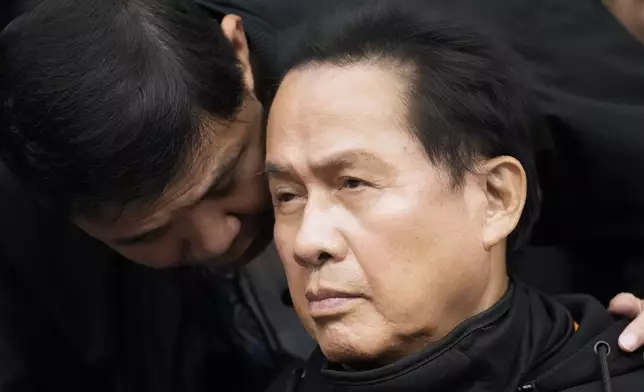 Apollo Quiboloy, a detained Filipino preacher accused of sexual abuse and human trafficking in the Philippines and similar charges in the United States, listens as he attends a senate inquiry at the Philippine Senate on Wednesday, Oct. 23, 2024, in Manila, Philippines. (AP Photo/Aaron Favila)