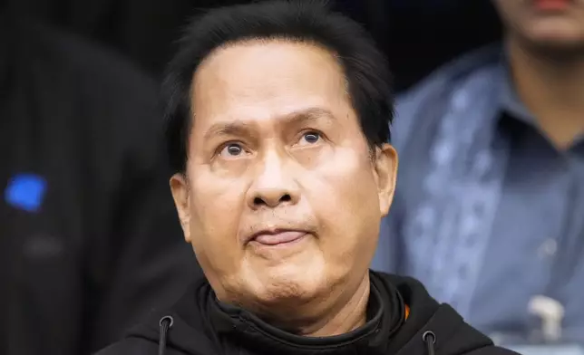 Apollo Quiboloy, a detained Filipino preacher accused of sexual abuse and human trafficking in the Philippines and similar charges in the United States, listens as he attends a senate inquiry at the Philippine Senate on Wednesday, Oct. 23, 2024, in Manila, Philippines. (AP Photo/Aaron Favila)