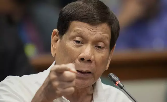 Former Philippine President Rodrigo Duterte speaks during a senate inquiry on the so-called war on drugs during his administration at the Philippine Senate Monday, Oct. 28, 2024, in Manila, Philippines. (AP Photo/Aaron Favila)