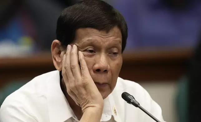 Former Philippine President Rodrigo Duterte attends a senate inquiry on the so-called war on drugs during his administration at the Philippine Senate Monday, Oct. 28, 2024, in Manila, Philippines. (AP Photo/Aaron Favila)