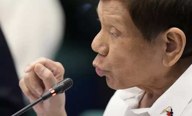 Former Philippine President Rodrigo Duterte speaks during a senate inquiry on the so-called war on drugs during his administration at the Philippine Senate Monday, Oct. 28, 2024, in Manila, Philippines. (AP Photo/Aaron Favila)