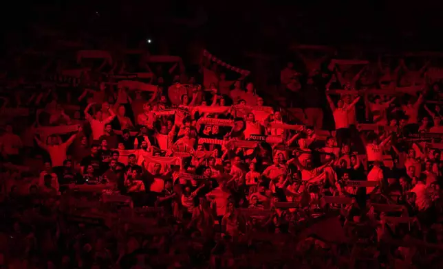 Benfica's supporters cheer during a Champions League opening phase soccer match between SL Benfica and Feyenoord at the Luz stadium in Lisbon, Wednesday, Oct. 23, 2024. (AP Photo/Armando Franca)