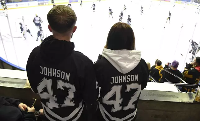 FILE - Nottingham Panthers fans wearing number 47, Adam Johnson's number, before the Ice Hockey Adam Johnson memorial game between Nottingham Panthers and Manchester Storm at the Motorpoint Arena, Nottingham, England, Nov. 18, 2023. (AP Photo/Rui Vieira, File)