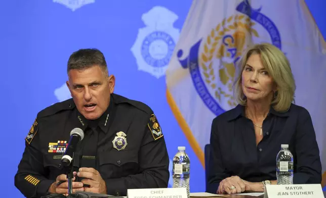 Omaha Police Chief Todd Schmaderer, left, speaks during a news conference on the fatal shooting of Steven Phipps Jr., 22, by police, next to Omaha Mayor Jean Stother, Wednesday, Oct. 2, 2024, at Omaha Police Headquarters in Omaha, Neb.(Nikos Frazier/Omaha World-Herald via AP)