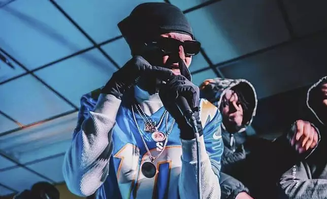 This early 2024 photo provided by Angela Phipps shows Steven Phipps performing music in Omaha, Neb. (Angela Phipps via AP)