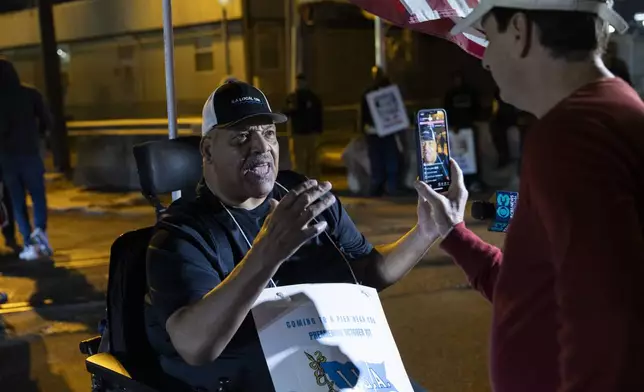 Boise Butler, president of ILA Local 1291, speaks to the press outside the Packer Avenue Marine Terminal Port in Philadelphia, Tuesday, Oct. 1, 2024. (AP Photo/Ryan Collerd)