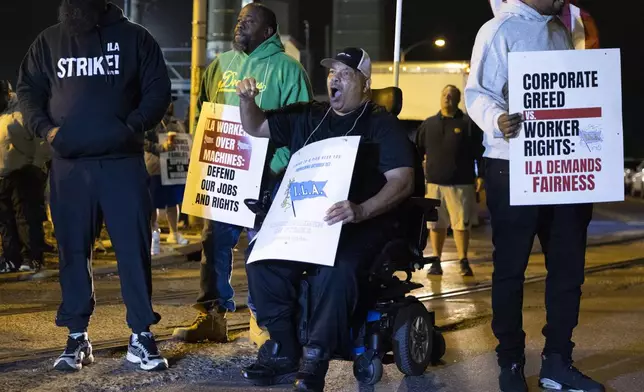 Boise Butler, president of Local 1291, chants along with his fellow longshoremen outside the Packer Avenue Marine Terminal Port in Philadelphia, Tuesday, Oct. 1, 2024. (AP Photo/Ryan Collerd)