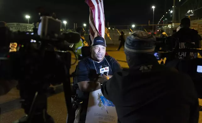 Boise Butler, president of ILA Local 1291, speaks to the press outside the Packer Avenue Marine Terminal Port in Philadelphia, Tuesday, Oct. 1, 2024. (AP Photo/Ryan Collerd)