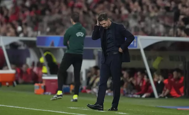 Atletico Madrid's head coach Diego Simeone reacts during of a Champions League opening phase soccer match between SL Benfica and Atletico Madrid in Lisbon, on Wednesday, Oct. 2, 2024.(AP Photo/Armando Franca)