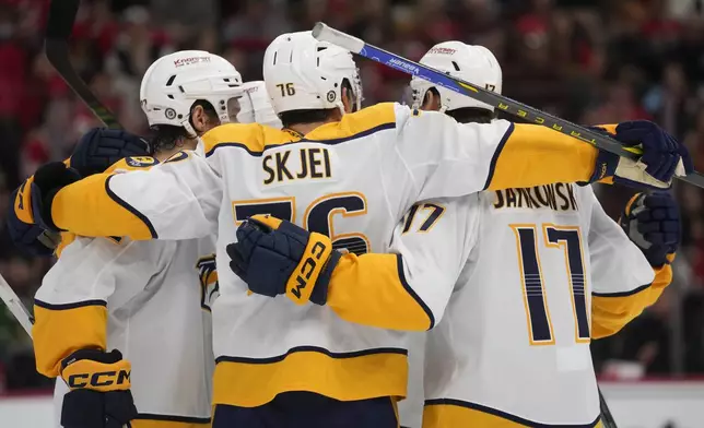 Nashville Predators defenseman Brady Skjei (76) celebrates his goal on the Chicago Blackhawks during the third period of an NHL hockey game Friday, Oct. 25, 2024, in Chicago. (AP Photo/Erin Hooley)