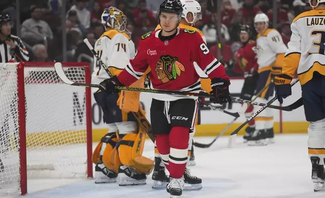 Chicago Blackhawks center Connor Bedard reacts after his shot is blocked by Nashville Predators goaltender Juuse Saros during the first period of an NHL hockey game Friday, Oct. 25, 2024, in Chicago. (AP Photo/Erin Hooley)